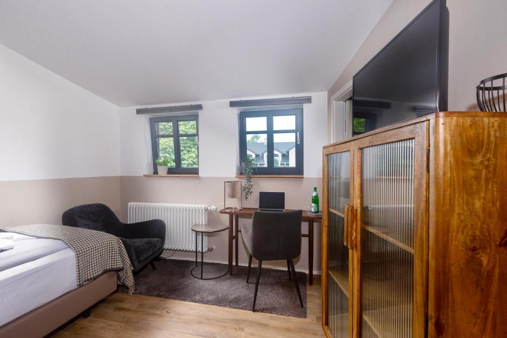 Postel nebo postele na pokoji v ubytování SEEBADHOF Berlin-Rangsdorf