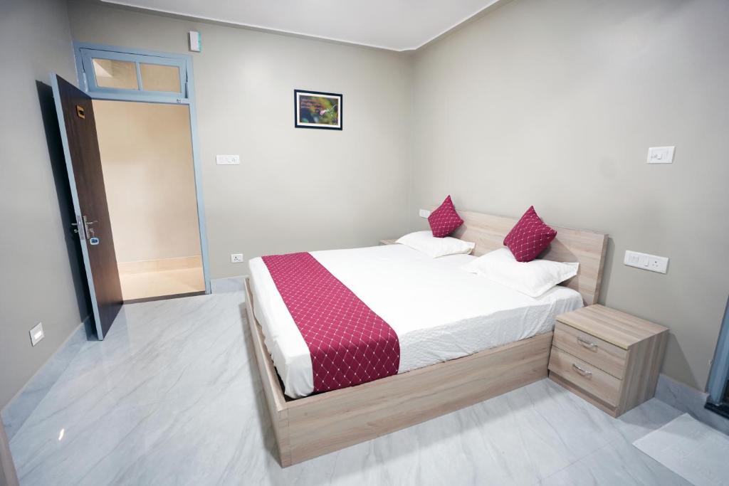 Postel nebo postele na pokoji v ubytování TheMapleVillageFarmstay