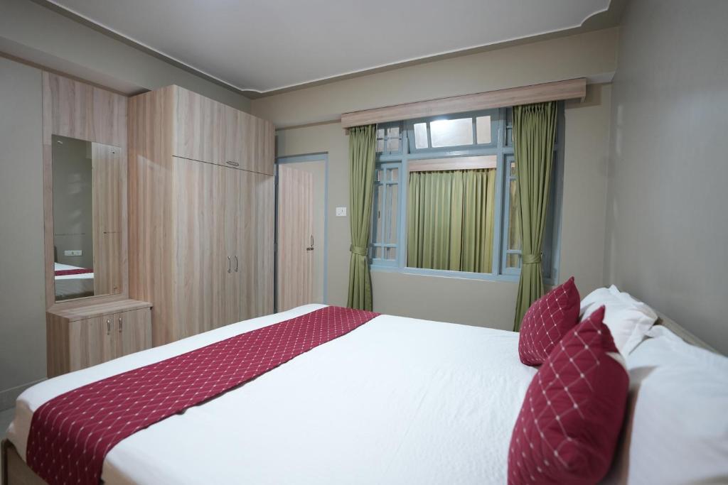 Postel nebo postele na pokoji v ubytování TheMapleVillageFarmstay