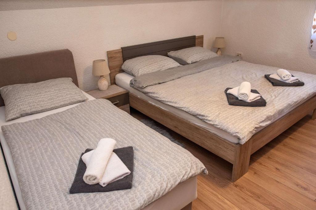 Posteľ alebo postele v izbe v ubytovaní Kuća za odmor Boki