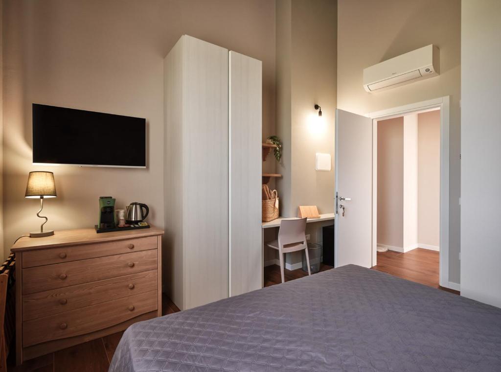 Postel nebo postele na pokoji v ubytování Agriturismo Corte Cea