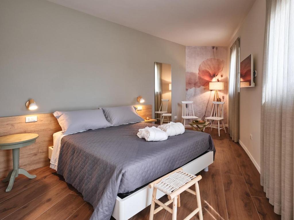 Postel nebo postele na pokoji v ubytování Agriturismo Corte Cea