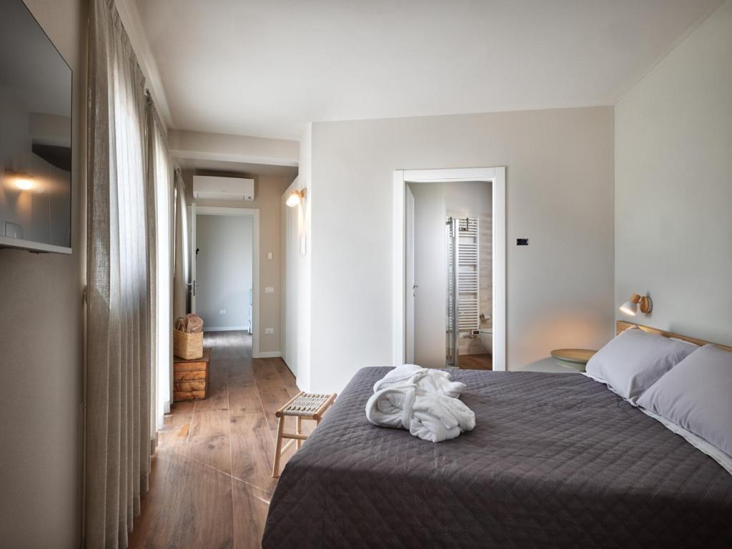 Postel nebo postele na pokoji v ubytování Agriturismo Corte Cea