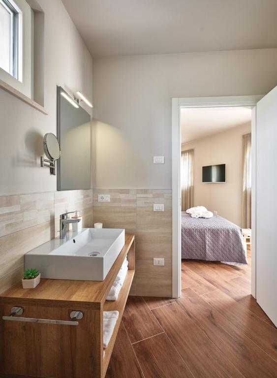 Postel nebo postele na pokoji v ubytování Agriturismo Corte Cea