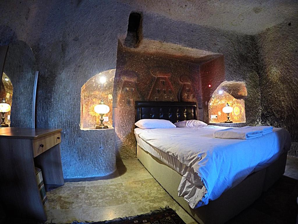 Postel nebo postele na pokoji v ubytování Coco Cave