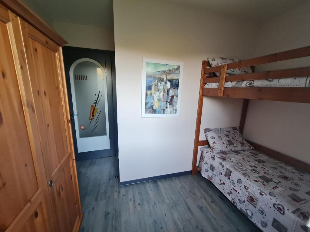 Postel nebo postele na pokoji v ubytování Piccolo Paradiso