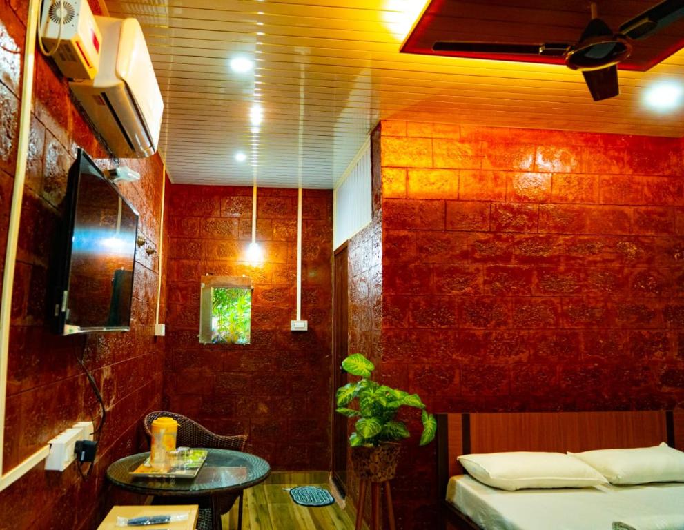 Postel nebo postele na pokoji v ubytování Good Vibes Homestay-Honnavar