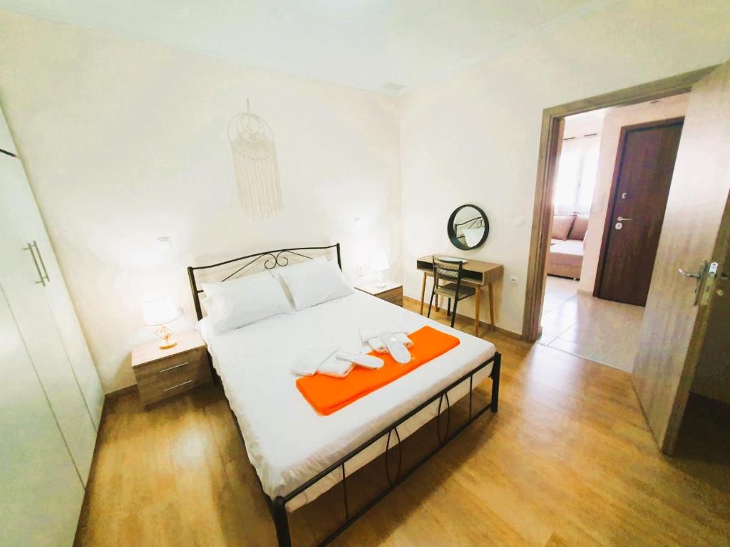 Ένα ή περισσότερα κρεβάτια σε δωμάτιο στο Estrella Apartment