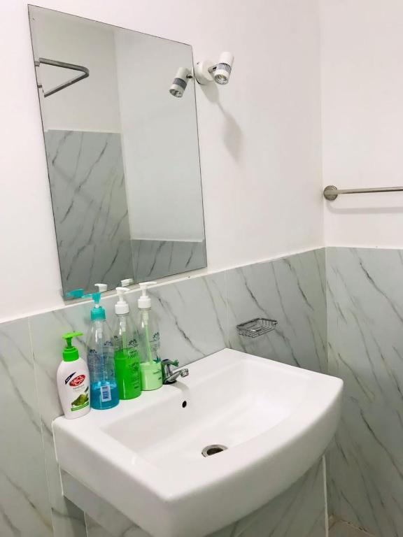 Koupelna v ubytování Kavee Transit Hotel