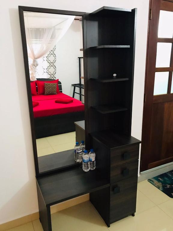 Postel nebo postele na pokoji v ubytování Kavee Transit Hotel
