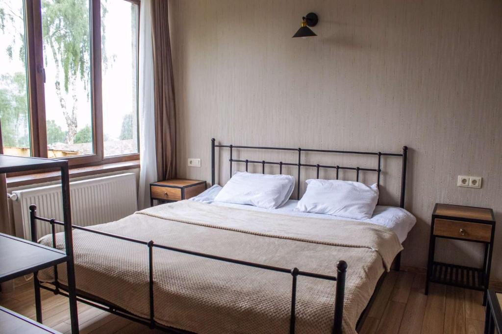 Postel nebo postele na pokoji v ubytování Garemta