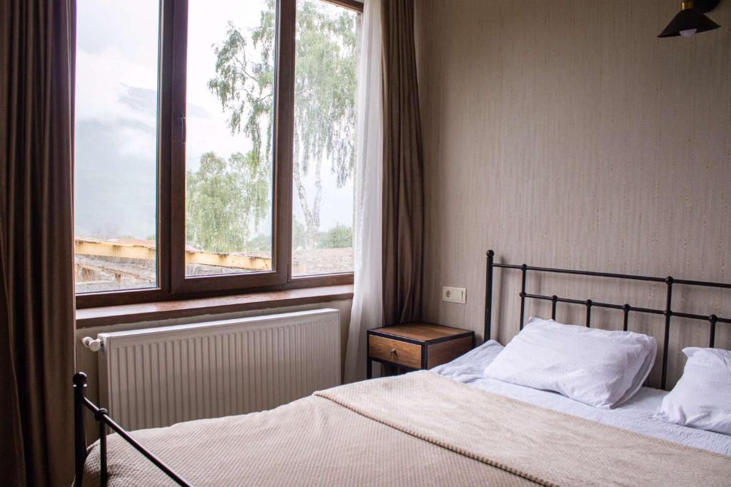 Postel nebo postele na pokoji v ubytování Garemta