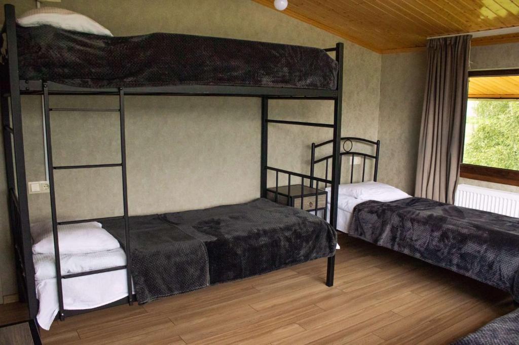 Postel nebo postele na pokoji v ubytování Garemta