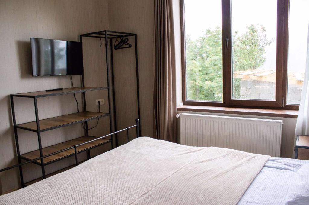Postel nebo postele na pokoji v ubytování Garemta