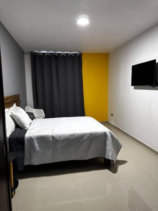 Postel nebo postele na pokoji v ubytování Casa Cómoda