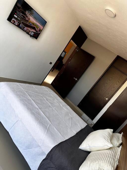 Postel nebo postele na pokoji v ubytování Casa Cómoda
