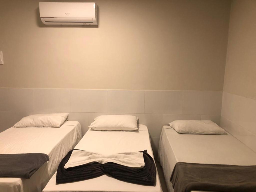 Postel nebo postele na pokoji v ubytování Honório Pousada-Caldas do Jorro BA