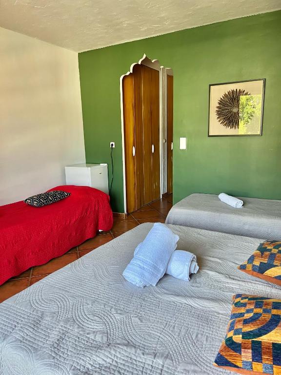 Postel nebo postele na pokoji v ubytování Hotel De La Gare