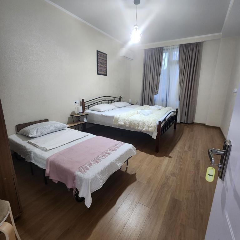 Postel nebo postele na pokoji v ubytování PANORAMA family hotel
