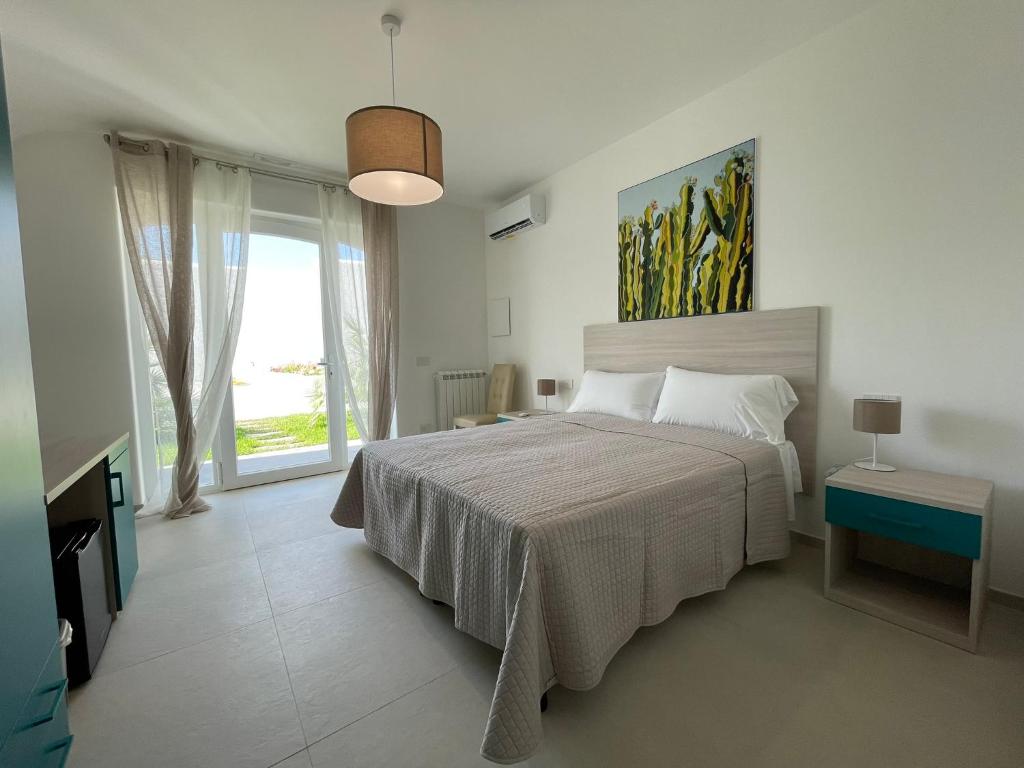 Postelja oz. postelje v sobi nastanitve Villa Palummera
