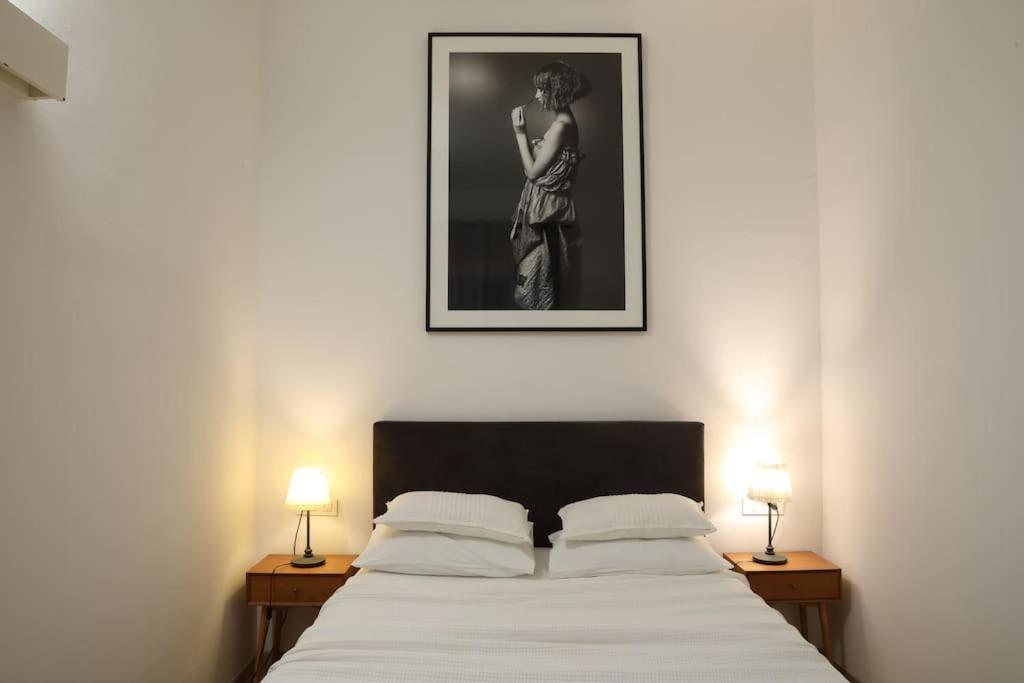 Ένα ή περισσότερα κρεβάτια σε δωμάτιο στο Premium Class Apartments IV