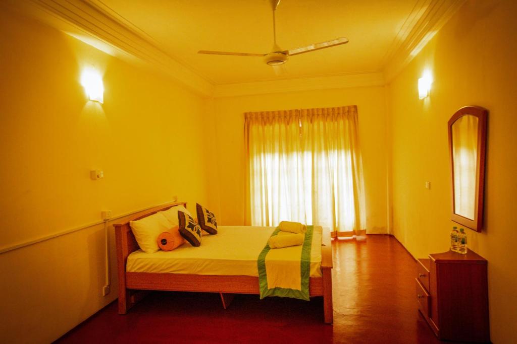 Postel nebo postele na pokoji v ubytování Sunbloom Hostel