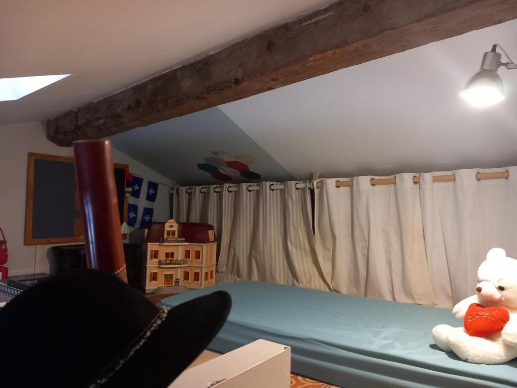 Postel nebo postele na pokoji v ubytování Chambre d'hote la passerelle