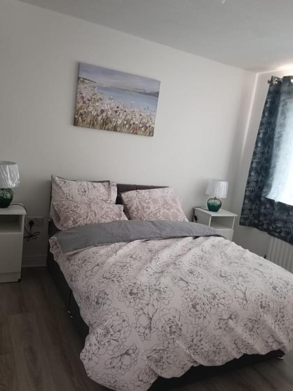Postel nebo postele na pokoji v ubytování Olashade Villa