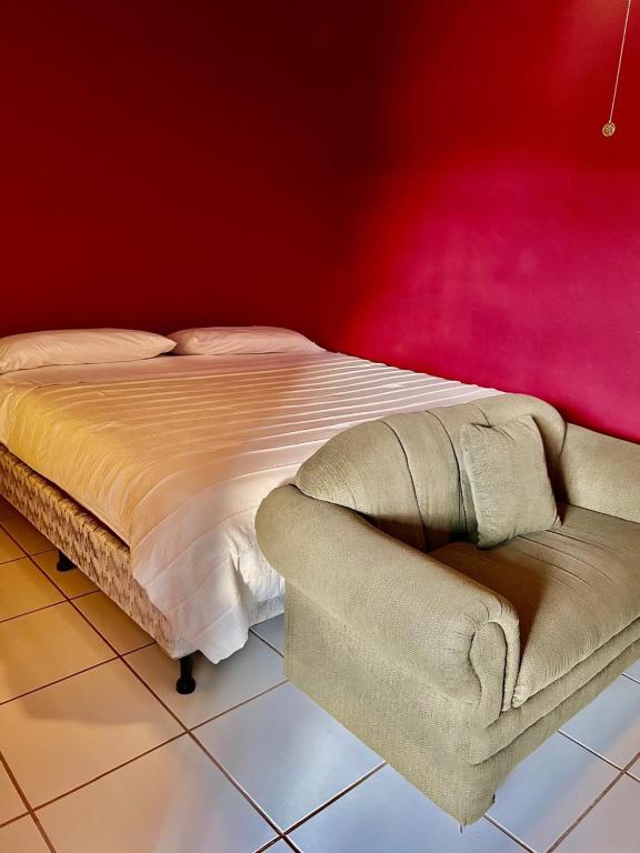 Postel nebo postele na pokoji v ubytování Aparta Hotel Palmerola