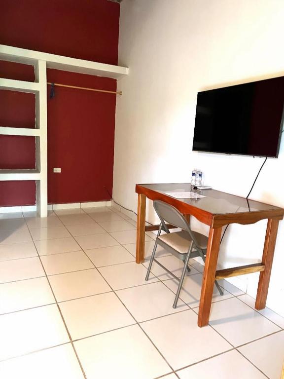TV a/nebo společenská místnost v ubytování Aparta Hotel Palmerola