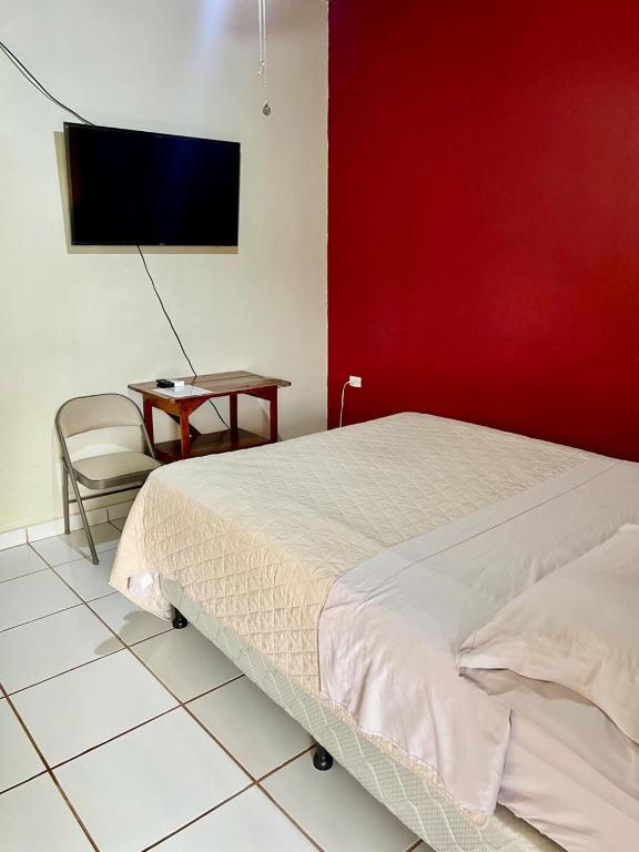 Postel nebo postele na pokoji v ubytování Aparta Hotel Palmerola
