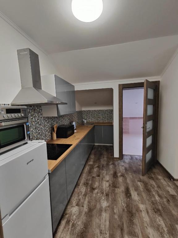 Kuchyň nebo kuchyňský kout v ubytování Villa Pirken Hammer