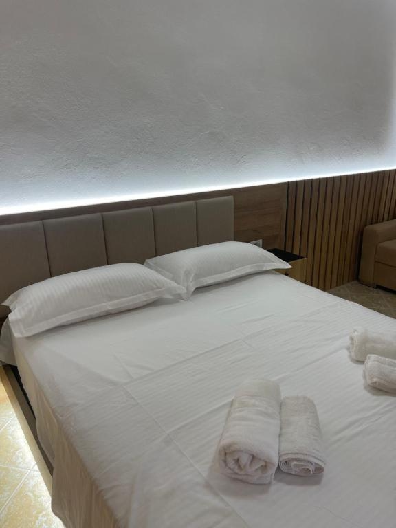 Postel nebo postele na pokoji v ubytování Hotel Riti