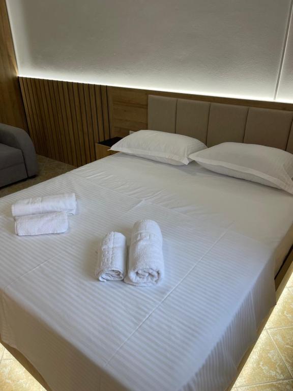 Postel nebo postele na pokoji v ubytování Hotel Riti
