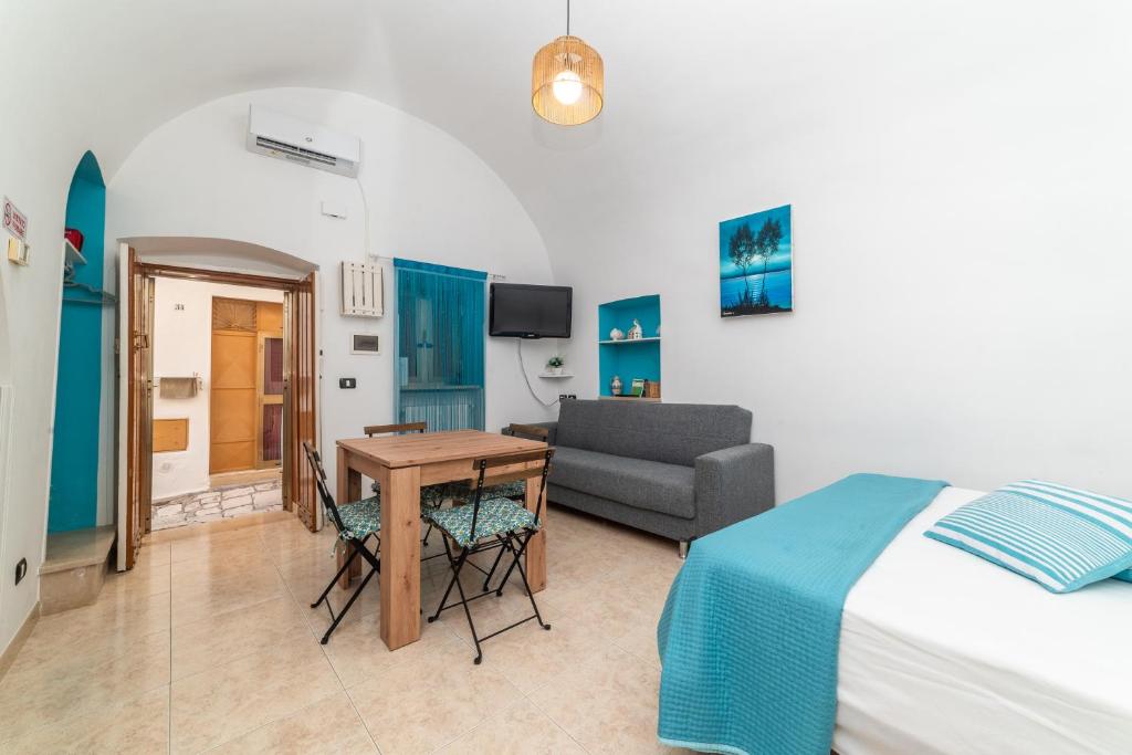Postel nebo postele na pokoji v ubytování Casa GianAngel Ostuni