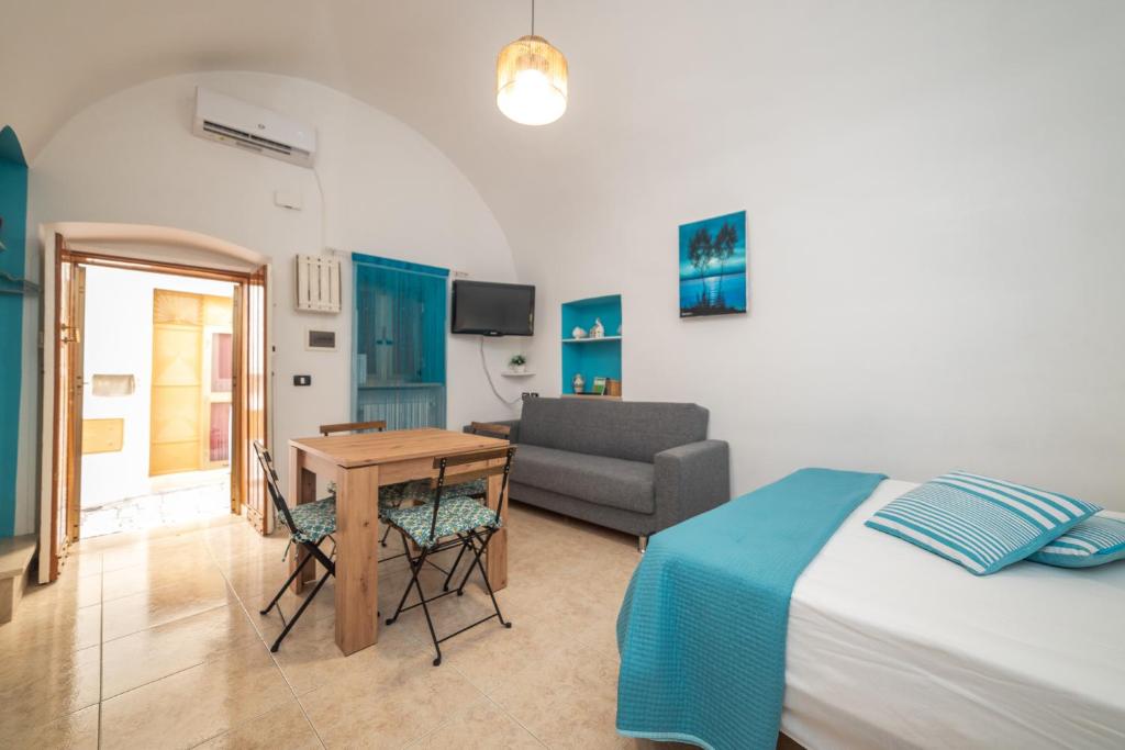 Postel nebo postele na pokoji v ubytování Casa GianAngel Ostuni