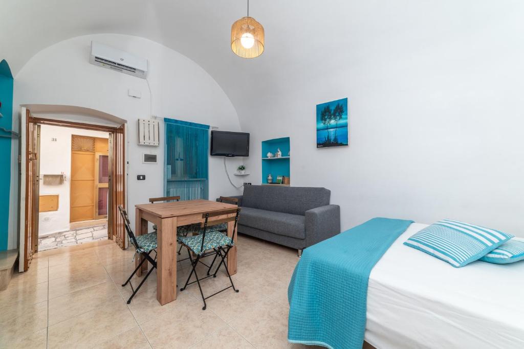 Postel nebo postele na pokoji v ubytování Casa GianAngel Ostuni