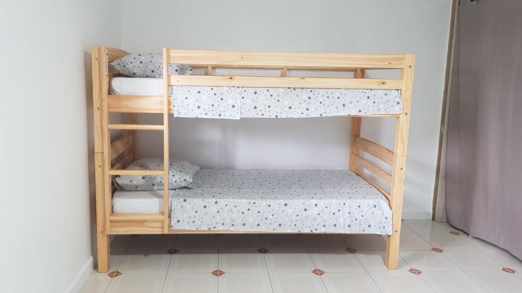 Postel nebo postele na pokoji v ubytování TI KAZ location vue mer