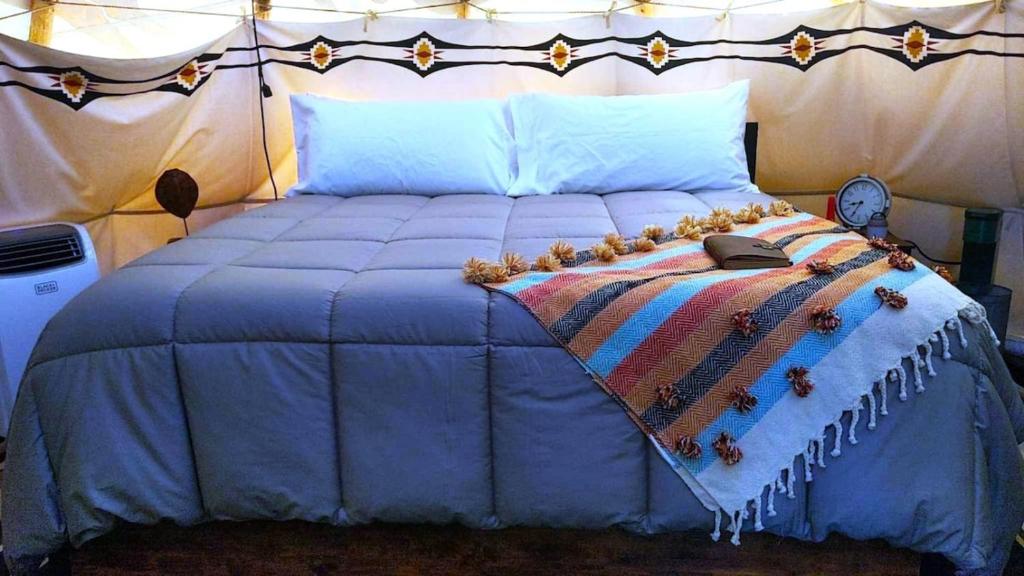 Wild Horses Luxury Tipi - Adjustable King Bed - Housity