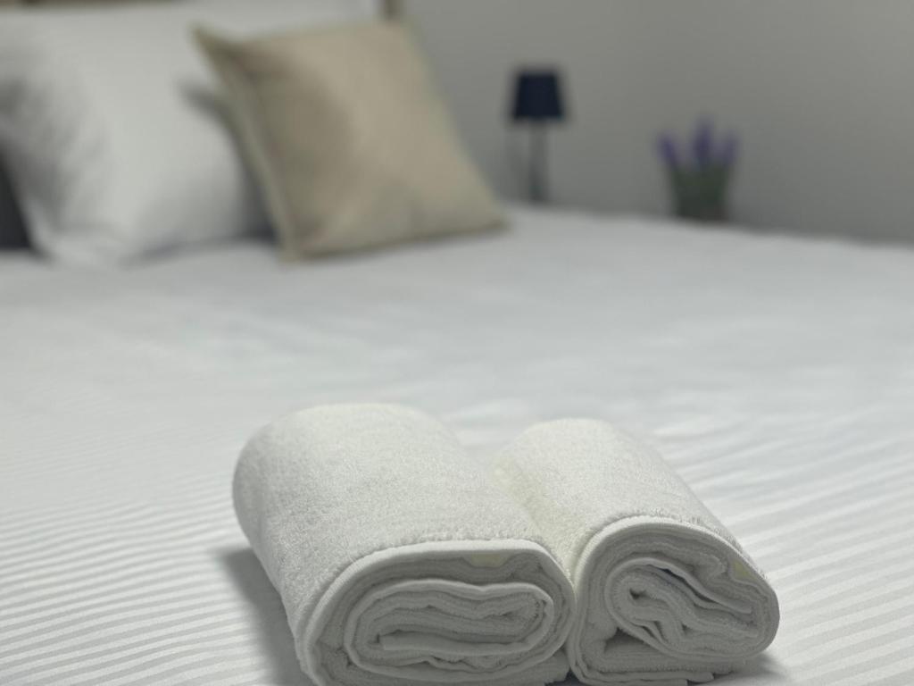 Postel nebo postele na pokoji v ubytování Next Rooms