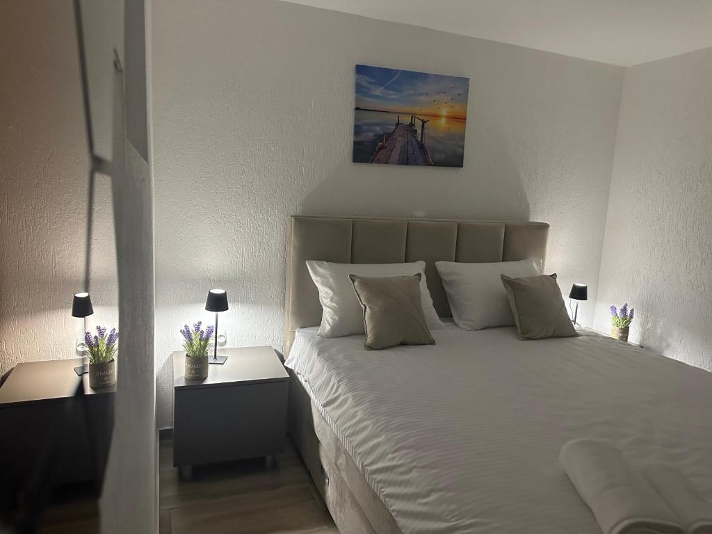 Postel nebo postele na pokoji v ubytování Next Rooms