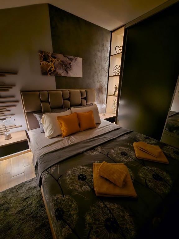 Postel nebo postele na pokoji v ubytování SOUL Apartman