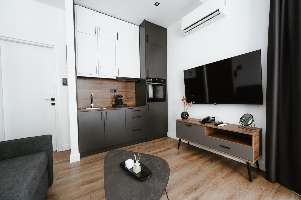 Kuchyň nebo kuchyňský kout v ubytování Port View Suites