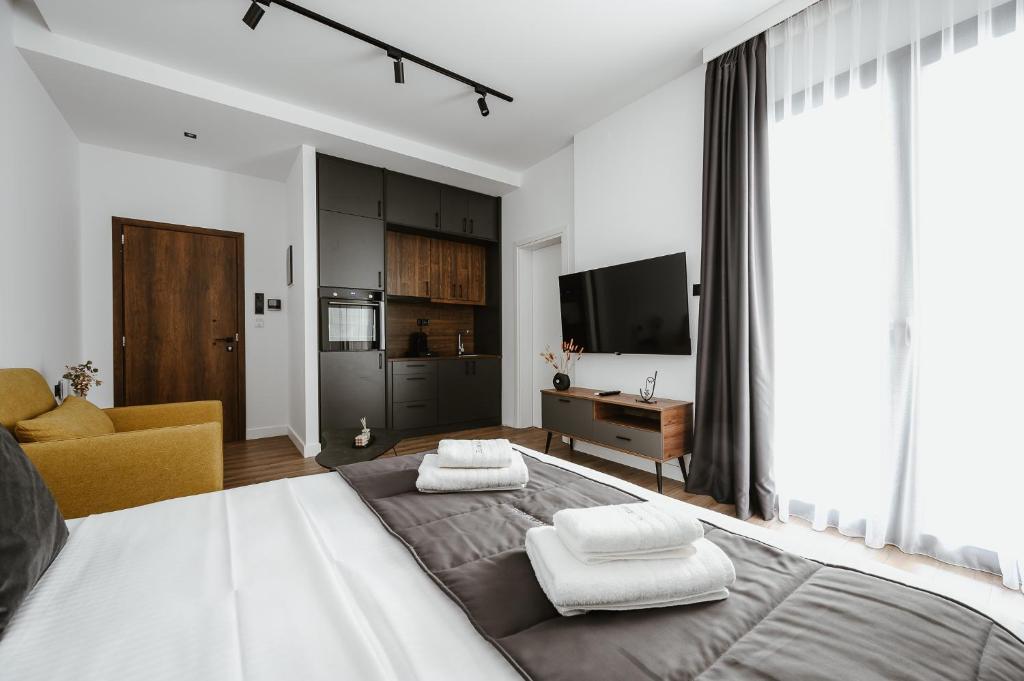 Postel nebo postele na pokoji v ubytování Port View Suites