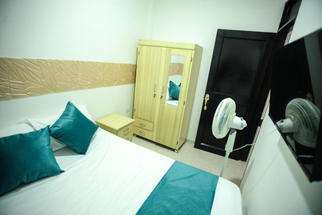 Postel nebo postele na pokoji v ubytování apartaestudios el portal del poblado