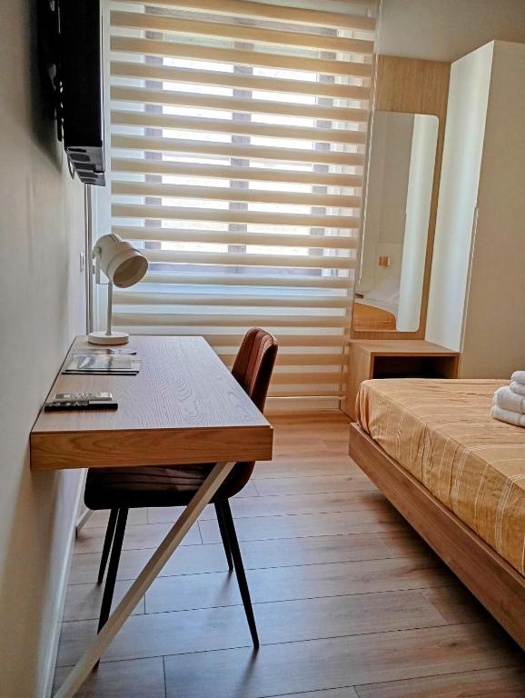 Postel nebo postele na pokoji v ubytování Letizia B&B