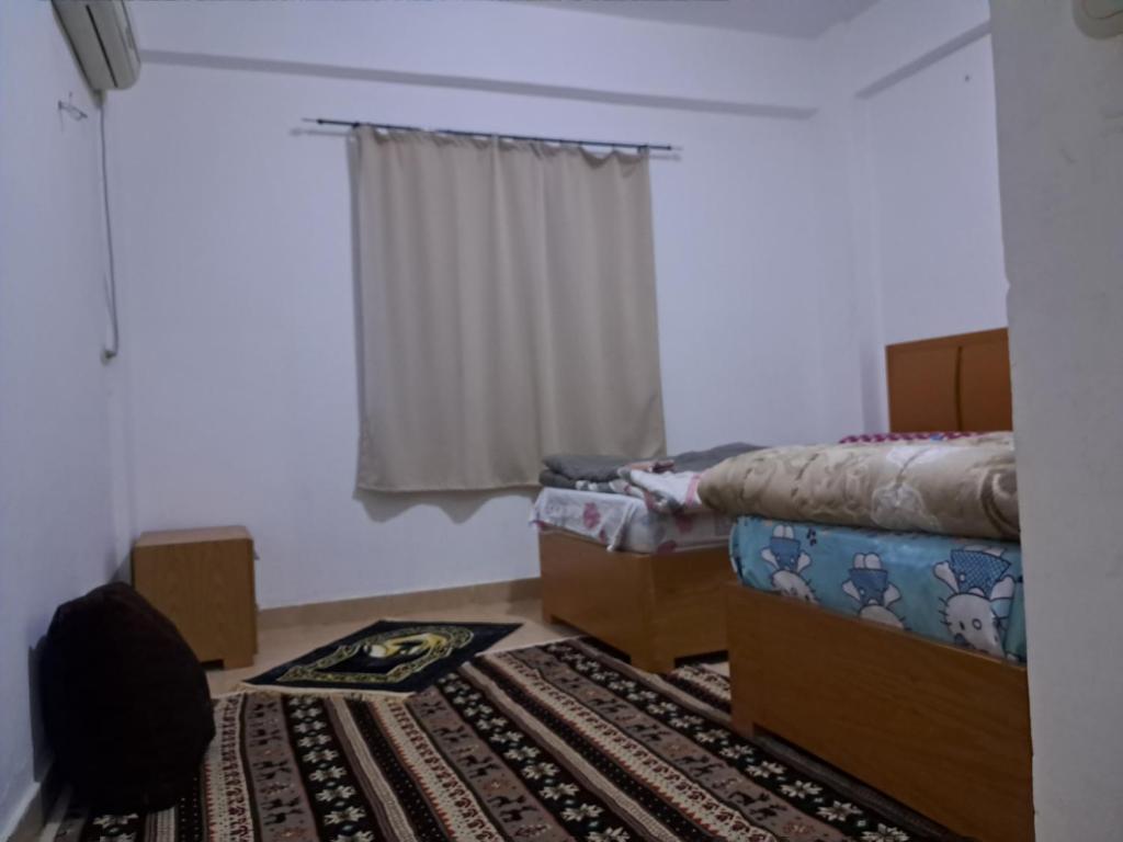 Postel nebo postele na pokoji v ubytování Top House Hostel Sharm El Sheikh