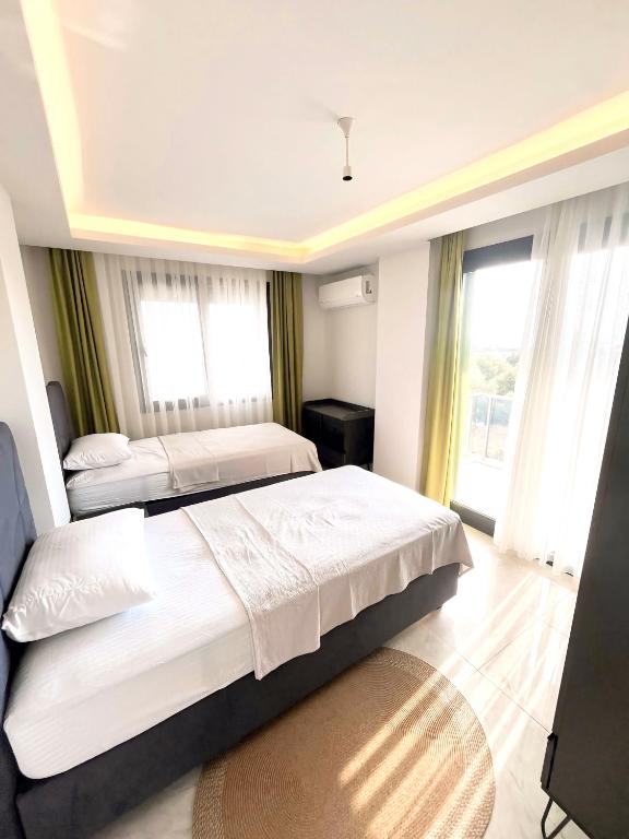 Postel nebo postele na pokoji v ubytování Premium Homes