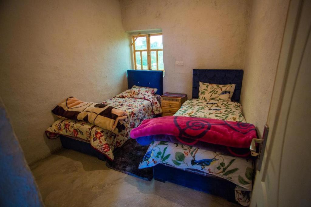 Postel nebo postele na pokoji v ubytování La Belle Etoile