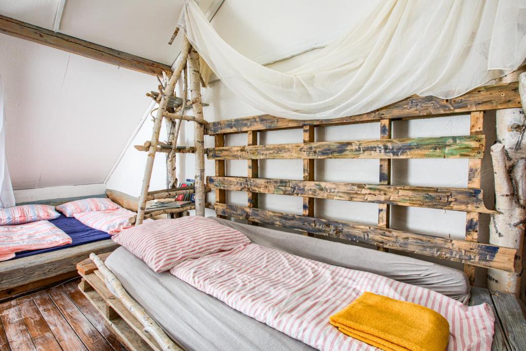 Postel nebo postele na pokoji v ubytování Tatra Magic